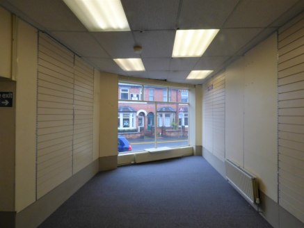 A superbly presented prominent ground floor retail unit, which was previously used as the post office.