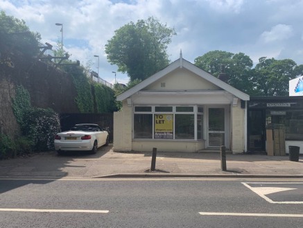 Premises and yard to let opposite Esher Train Station