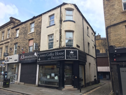 The premises briefly comprise a former bakery and café having accommodation over four floors situated within the centre of Halifax town. 

Split over four floors the property offers kitchen and café takeaway facilities to the ground floor with seatin...