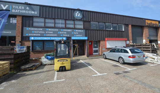 The property comprises a mid-terrace unit of steel frame construction with brick and cladded elevations. Portal ground floor comprises warehouse space benefitting from an eaves height of 6m, an electric roller shutter loading door and first floor off...