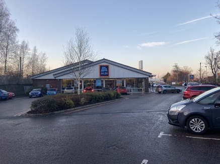 The property comprises a purpose built Food Store, together with an adjoining surface car park for 92 cars.