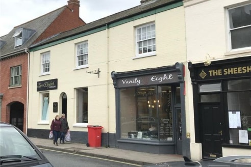 Prominent town centre retail premises. The property is arranged over ground floor providing open plan retail on split levels to the front elevation. To the rear are two further rooms which could be used for treatments or as ancillary office. The spac...