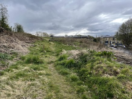 The property briefly comprises a triangular parcel of land in the Boothtown area of Halifax. The topography of the land slopes from roughly East to West and is overgrown with trees and shrubs.

Planning

The property benefits from Planning Permission...