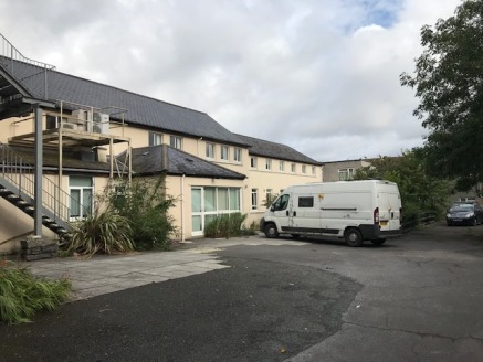 The original part of the building being the front elevation is Grade II listed. Over the years the building has been extended to the rear to provide additional accommodation utilized as a care home facility. There is a substantial parking area also l...