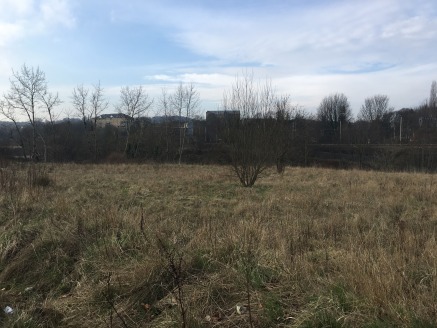 The site comprises a generally level plot of land with extensive open frontage to Leeds Road. The freehold site is suitable for commercial or residential development (subject to planning permission) and is available with vacant possession. 

The subj...