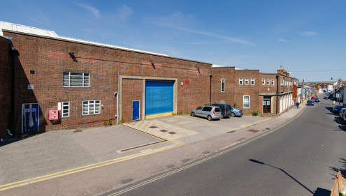 * Former vehicle workshop and stores previously occupied by Sussex Police

* Externally there are yards, surface car parking and a fuel filling pump

* Existing use or redevelopment potential

* Unique opportunity to acquire a development opportunity...