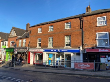 A ground floor retail unit currently used as a pharmacy set within a 3 storey building.

The space includes large retail space together with rear space for workroom, Kitchen and two WC facilities.

The property benefits from suspended ceilings, cat I...