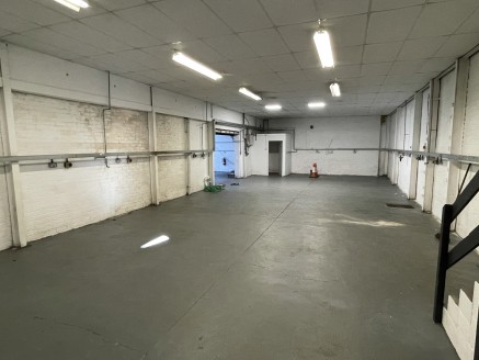 The premises briefly comprises a ground floor industrial unit situated within the Phoebe Lane Mills industrial site located on the outskirts of Halifax Town Centre.

The unit benefits from having a steel roller shutter door providing drive in access,...