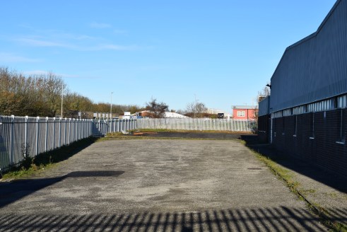 TO LET / FOR SALE - DETACHED INDUSTRIAL PREMISES.

The property comprises an open plan steel portal framed industrial unit with brick walls to dado level and cladding to the elevations. To either side of the main warehouse area there are two annexes...