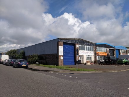 The unit is a prominent corner positioned industrial premises of steel portal frame construction with brick block and part steel cladding offering factory with WC, reception and offices over ground and first floor measuring approximately 3,371 sq ft....