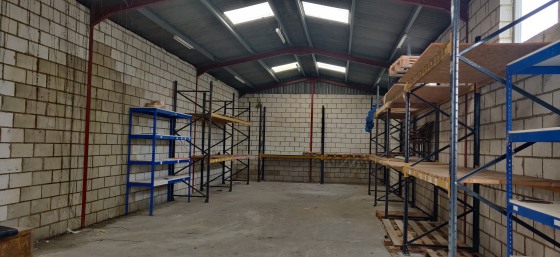 The premises consist of a detached industrial warehouse of steel portal frame construction with block work walls and a pitched roof. 

The unit is primarily open plan but there is a small office and WC to the front. There is also a large private yard...