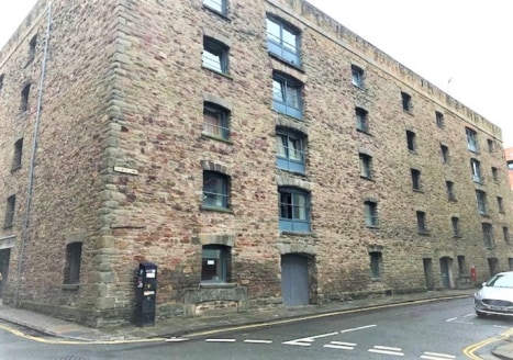 Protheroes House comprises a substantial listed former wine warehouse built in circa 1800. the upper floors have been converted into private apartments. The Ground Floor comprises unique commercial accommodation, most recently used as a language scho...