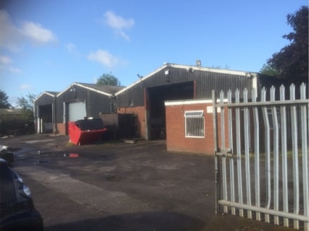 Three workshops plus office extending in total to 9,085 sq.ft. (844 sq.m.) on a total site of 0.5 acres (0....