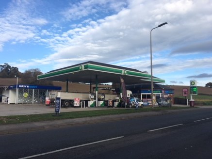 The property comprises a prominent Petrol Station with Forecourt sales, shop, car wash and separate workshop buildings. 

The Petrol Station and workshop sit on a site of 2.65 acres.

Both elements of the site are currently let, the Petrol Station wi...