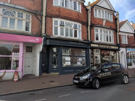 The premises comprise a mid-terraced retail unit which has recently been re-decorated and is presented in good order. The property benefits from a traditional wooden shop front, bright main sales area with spotlights, rear office, kitchen, and W.C.