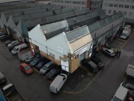 The subject premises comprise a prominently located, end of terrace, 1960's built steel truss frame industrial building to a pitched roof. The warehouse area is of an open-plan layout, situated over the ground floor and ancillary office accommodation...