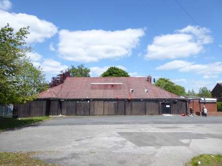 The property comprises a single storey detached former social club with adjoining car park/land. The property is located on a fairly level, regular shaped site of approx. 0.74 acres.

The social club is of brick construction beneath a mixture of pitc...
