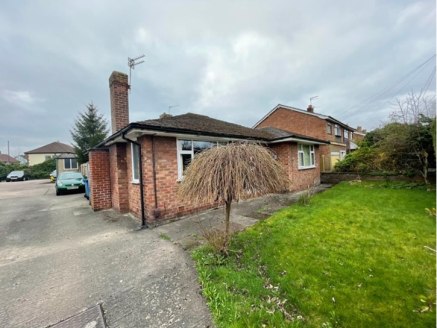 The property comprises a 0.35 acre plot, that currently contains a detached single storey former funeral home, detached residential bungalow that is currently let and occupied, two large detached garages and parking and gardens. 

The property enjoys...