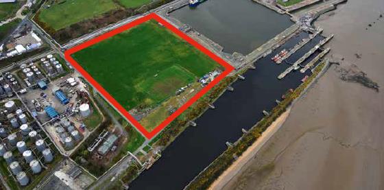 2.5 acres. Concrete hard standing. Bulk conveyor from berth in situ. Open storage / import/export terminal, processing or development. Adjacent to the Manchester Ship Canal. Can be connected to Ellesmere Port Docks via private road network within Pee...