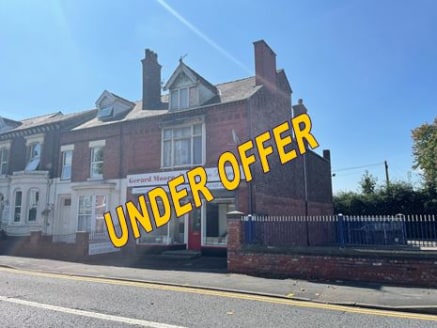 We are delighted to offer for sale a rare main road freehold opportunity, that offers untapped development potential. 

The property comprises a substantial end terrace retail property with living accommodation to part of the upper floors.

The groun...