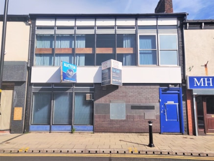The property comprises a building of masonry construction arranged over two floors. The building features a retail unit on the ground floor and office/storage accommodation to the floor above. 

The property is located on Market Street between Morley...