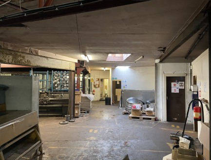 The property comprises a single storey triple bay former engineering workshop unit together with administrative offices and further workshop situated to the front. The workshop benefits from;

 Solid concrete floor:

 Fluorescent strip lighting:

 Mi...