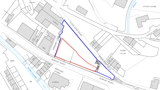 The property briefly comprises an area of land predominantly utilised as a car park. The site is broadly triangular is shape and is currently split between an area of hard surfaced yard and woodland. It is largely of a relatively level topography thr...