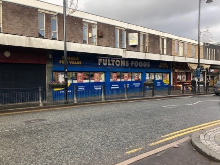 The premises comprise a large glazed fronted, ground floor retail unit set within a two-storey parade of brick built properties. Internally, the accommodation is divided to form an open plan ground floor sales area with additional first floor staff/s...