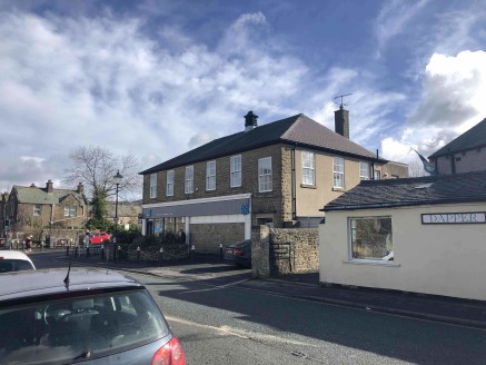 The property comprises an attractive detached building constructed in stone and set under a pitched slate roof. The available accommodation is on the first floor above the trading store which is accessed to the front right of the property. Internally...