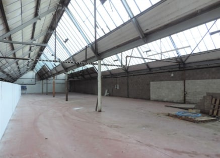 A rectangular shaped substantial workshop/warehouse available for immediate occupation within a factory complex in the borough of Hyndburn.\n\nThe unit has been occupied by a school uniform supplier for a number of years and extends in total to 7,330...