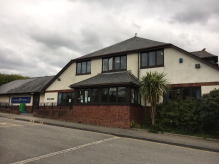 The property comprises a detached two storey purpose built doctor's surgery dating from the late 1980's / early 1990's. The building includes an attached single storey purpose built pharmacy which was subsequently extended in 2007. The property has a...