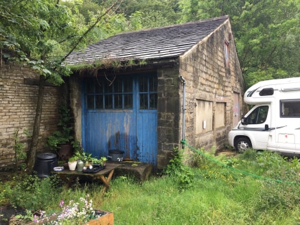 The premise briefly comprises a single storey stone built workshop situated conveniently close to Hebden Bridge town centre.

The property benefits from a solid floor and two timber loading doors providing drive in access to both the front and side e...