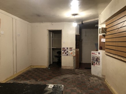 The property comprises a traditionally constructed, three-storey building arranged as a retail unit at ground floor level with useful basement storage and self-contained upper floors in need of renovation. The retail unit benefits from a traditional...