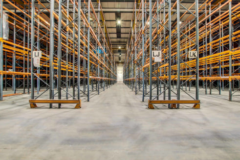 High bay racked warehousing under refurbishment. Good access to J63 & J64 A1(M). Level and level access doors. Eaves height up to 10.4m. New LED lighting. New power distribution throughout. Extensive service yard.