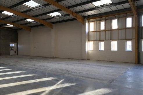 Two modern units providing clear span warehousing, with two roller shutter doors per unit under a pitched roof. Benefits include translucent roof light panels, fluorescent strip lighting, male and female wc's. The property has an eaves height to the...