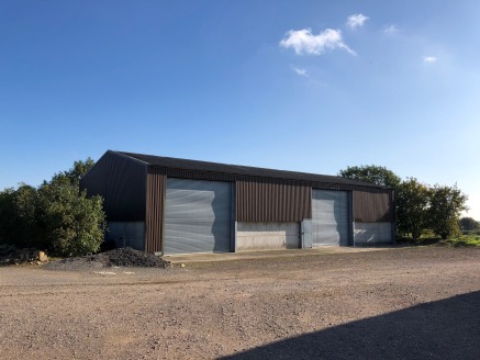 College Farm Barn comprises a single-storey agricultural building. The interior is open plan and benefits from one loading door (4.7m H x 4.88m W). The unit has a height to eaves of 4.54m and ridge height of 6.07m. The premises will benefit from WC's...