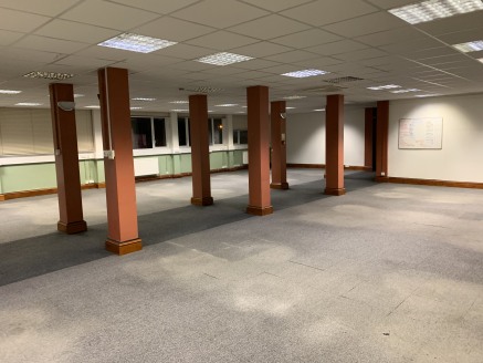 This first floor office suite currently provides predominantly modular office rooms formed by way of stud partitions with some areas open plan and includes kitchen and WC facilities. There is a reception area to the ground floor. 

This site benefits...