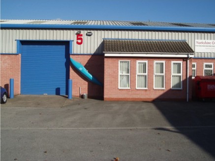 The property comprises a single storey industrial unit of 241 m2 (2600 ft2), which is divided to form: reception office, toilet and workshop. The workshop has a painted floor, lighting and a roller shutter door.

To the outside is a compound availabl...