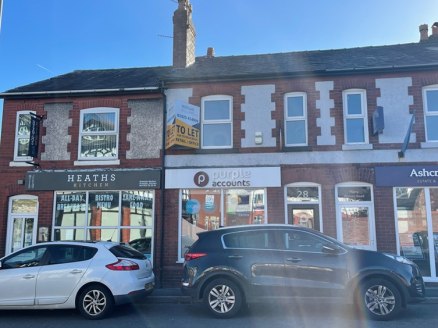 A two storey mid-terraced retail/office property, that is currently occupied as an accountants. 

A new Lease is available direct from the Landlord.

The ground floor comprises a large open office/retail area with rear kitchen and wc. The first floor...