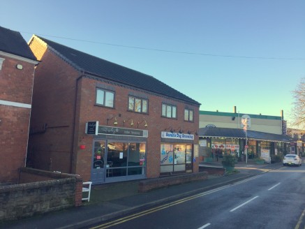 The property is situated in a secondary trading position in the town centre at the end of the main shopping thoroughfare and on the south side of Brewery Street close to its junction with Forge Road and Lichfield Road. The area is characterised by a...