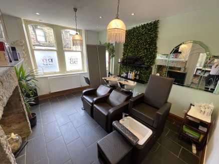 The premises comprise the ground floor and part first floor of an atractive stone building. The ground floor accommodation forms an extremely well presented salon, with glazed display window, tiled flooring, feature lighting, kitchen and toilet facil...