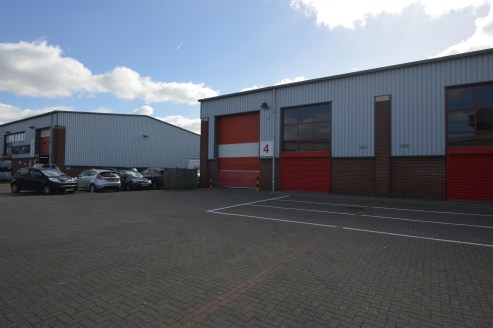 The premises comprise an end of terrace single storey steel framed building with brick profile steel cladding to the roof and brick and partial steel profile cladding to the front and side elevations.

In addition, there is a generous car parking / y...