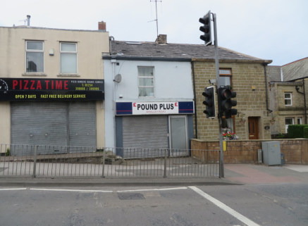 PROPERTY INFORMATION\n\n* Prominent Main Road location\n* Large shop with flat\n* Roller Shutter Security\n* Gross income of &pound;10,200 per annum\n\nLOCATION\n\nThe property is situated on Whalley Road (A680) being in close proximity to the juncti...