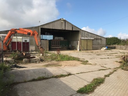 The subject premises provide a substantial storage / warehouse unit with a large wrap around yard providing ideal boat storage or similar for any local businesses. The yard area to the front provides excellent secure parking which extends alongside t...