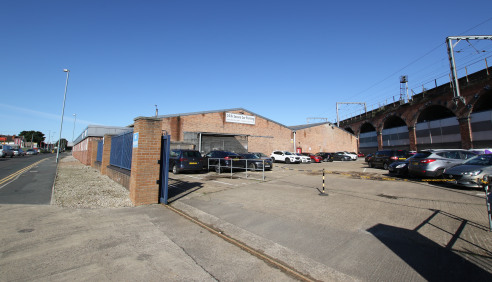 The Space Centre comprises of a 2 bay industrial / warehouse unit comprising the following specification; 

- Steel portal frame with brick elevations

- 4 Ground level loading doors

- Solid concrete floor

- Lighting to warehouse

- 1st floor WCs...