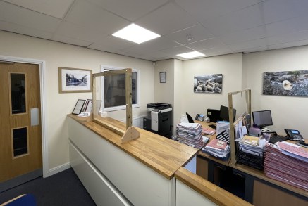 The property comprises a mid terrace two storey stone building under a pitched tiled roof with a single storey ground floor extension.

The ground floor has been partitioned to provide two office suites with a small reception area. A further office a...