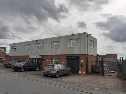 The premises comprise an industrial building consisting of two bays to the rear with two storey offices to the front. The property benefits from yard space to the side and car parking to the front....