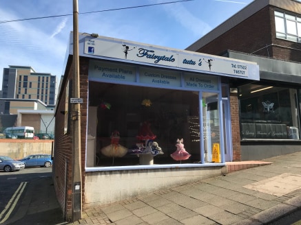 The property comprises a ground floor retail unit set within a two storey brick built shopping parade. Internally the accommodation is divided to form a front sales area with rear staff/storage accommodation.