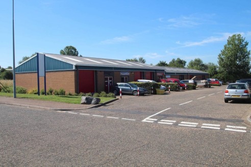 Trafalgar Industrial Estate comprises a range of compact single storey units. The unit is steel framed with cavity brickwork elevations, profile metal sheet cladding, under pitched metal decked roof. The unit enjoys drive-in access via metal sectiona...