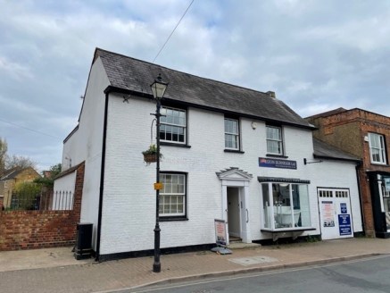 The property is situated on the east side of High Street in the centre of the town of Burnham, 100 m or so south of its junction with Jennery Lane and its public car park. No 32 is an attractive period building on the sunny side of the street, next t...